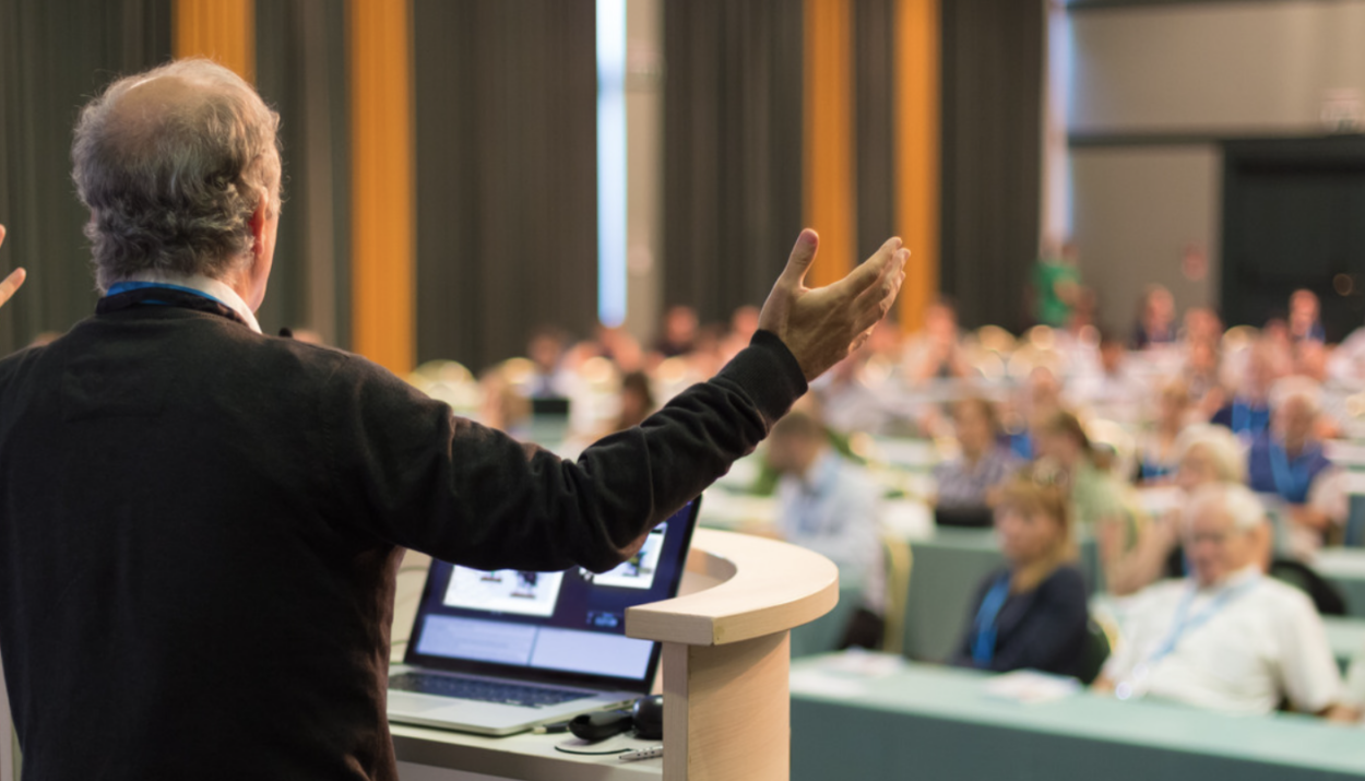 Giving a talk at an RV trade show.