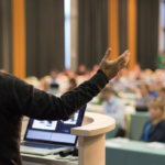 Giving a talk at an RV trade show.