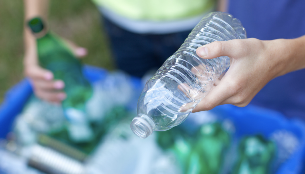 Throwing away trash at an RV park.