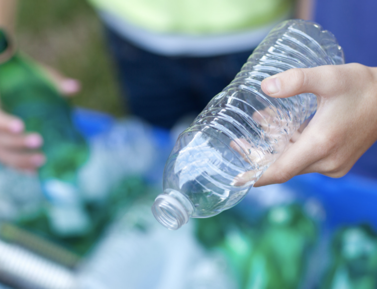 Throwing away trash at an RV park.