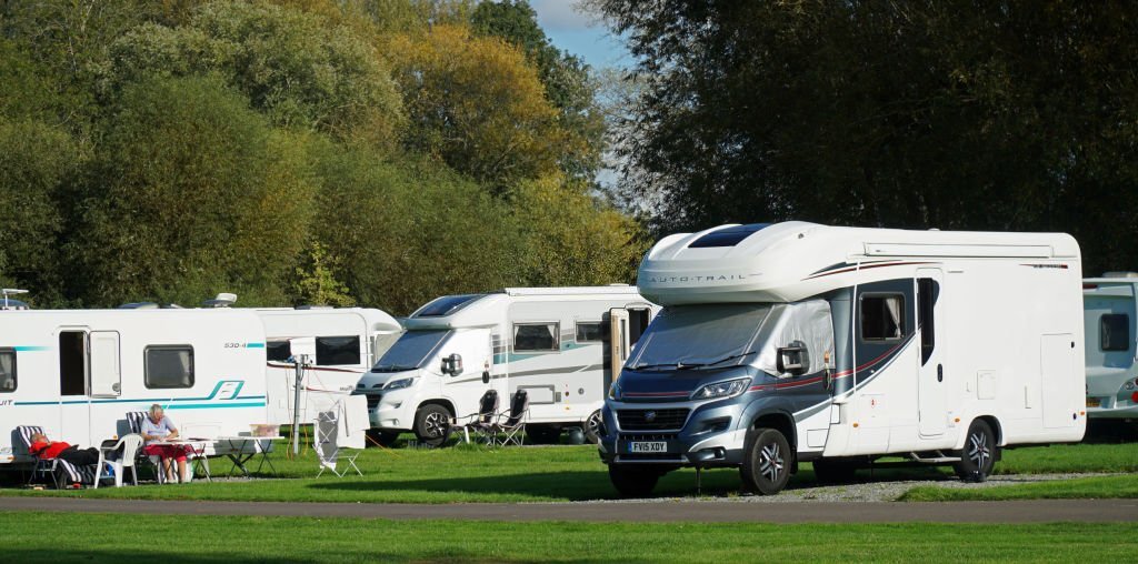 Campérs relaxing in an RV park