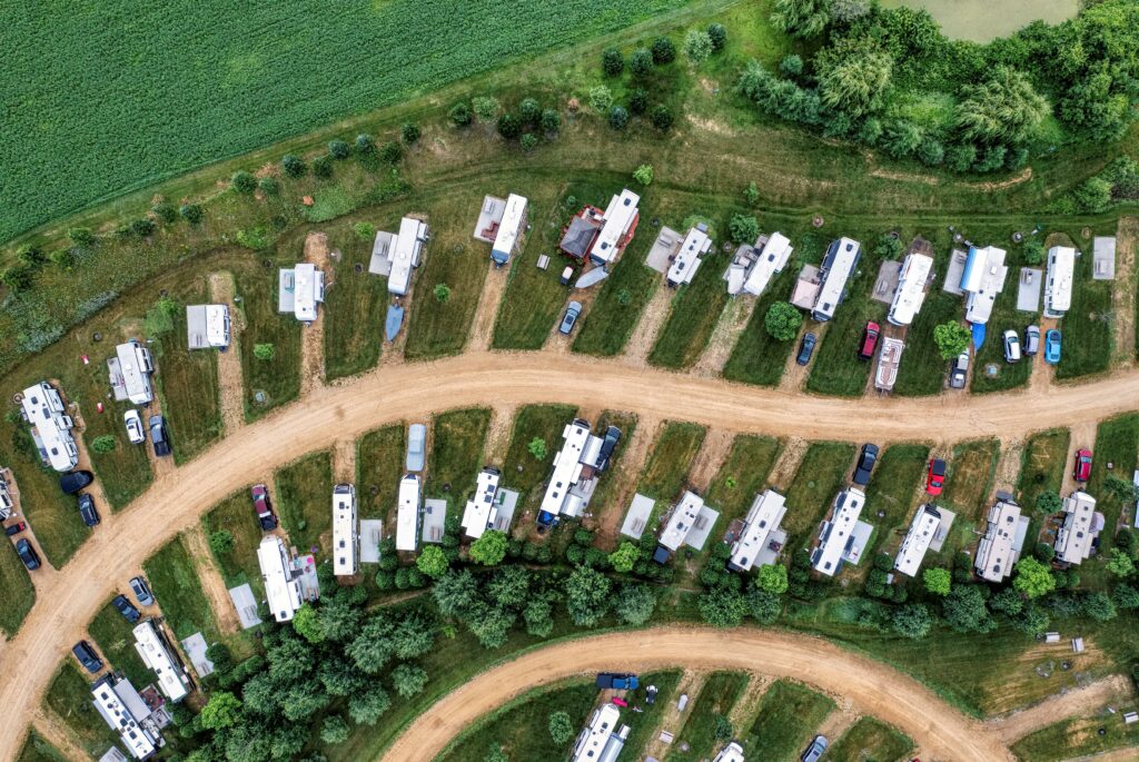 a group of campers in their respective spaces with a campground manager software