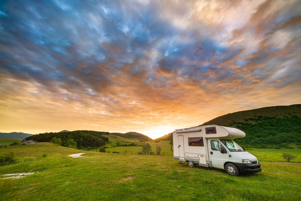 A campground with a beautiful view of the sunset 