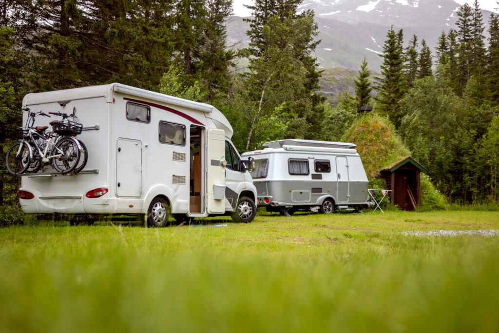 two camper vans in their camp spots 