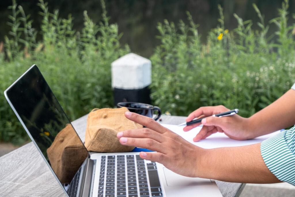 a man checking the integrated payment processing of his campsite booking software 