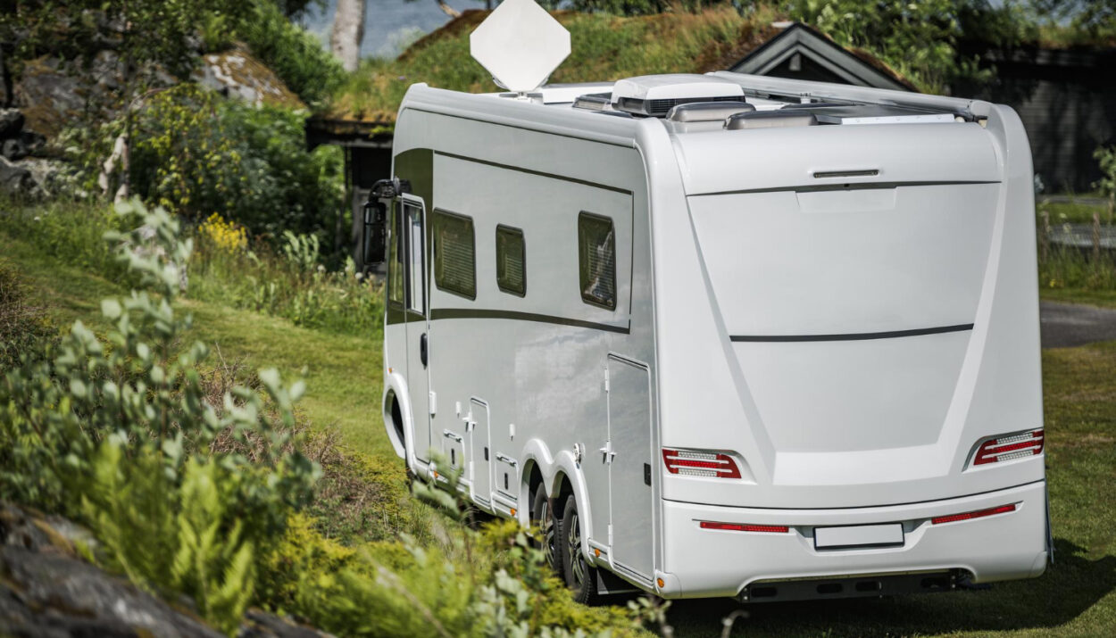 a camper van staying in a RV park using reservation software system