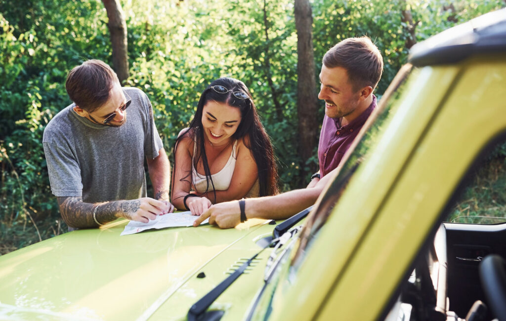 three people seeing the information of their rv park to give feedback 