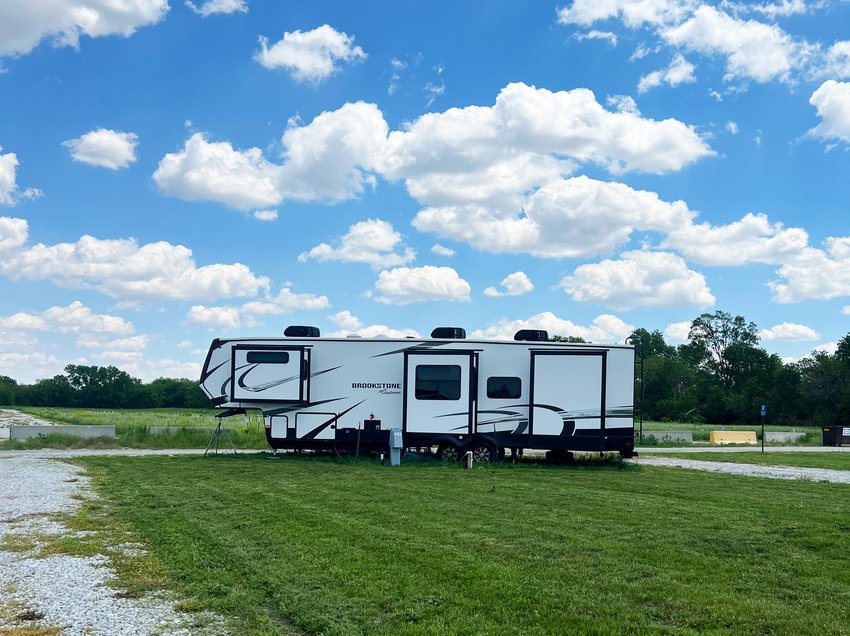 Camper parked in grass campsite